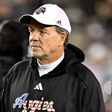 Nov 11, 2023; College Station, Texas, USA; Texas A&M Aggies head coach Jimbo Fisher looks on during warm ups prior to the game against the Mississippi State Bulldogs at Kyle Field. Mandatory Credit: Maria Lysaker-Imagn Images