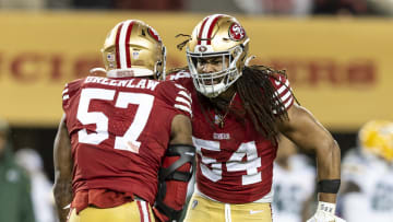 San Francisco 49ers linebackers Dre Greenlaw (57) and Fred Warner (54)