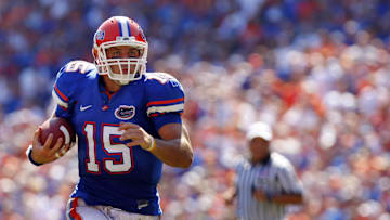 September 27, 2008; Gainesville FL, USA; Florida Gators quarterback Tim Tebow (15) runs with the ball against Mississippi Rebels during the fourth quarter at Ben Hill Griffin Stadium. Mississippi beat the Gators 31-30. Mandatory Credit: Kim Klement-Imagn Images