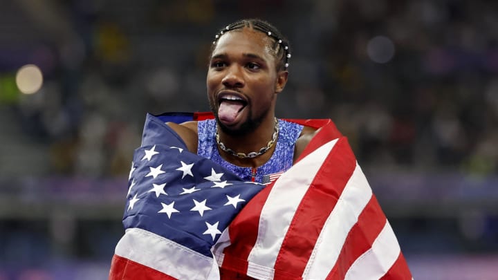 Aug 4, 2024; Paris Saint-Denis, France; Noah Lyles (USA) celebrates after winning the menís 100m final during the Paris 2024 Olympic Summer Games at Stade de France. Mandatory Credit: Yukihito Taguchi-USA TODAY Sports