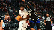Mississippi State's Brandon Walker drives to the basket against New Orleans.
