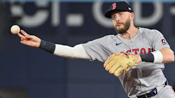 Boston Red Sox shortstop Trevor Story (10) throws out Toronto Blue Jays catcher Alejandro Kirk (not shown) in the seventh inning at Rogers Centre.