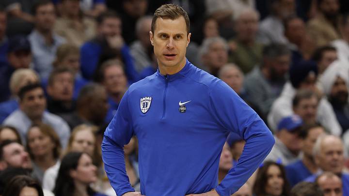 Mar 29, 2026; Washington, DC, USA; Duke Blue Devils head coach Jon Scheyer looks on against the UConn Huskies in the first half during the Elite Eight.