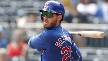 Aug 28, 2024; Pittsburgh, Pennsylvania, USA;  Chicago Cubs right fielder Cody Bellinger (24) hits into a fielders choice against the Pittsburgh Pirates during the seventh inning at PNC Park. Mandatory Credit: Charles LeClaire-Imagn Images