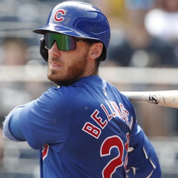 Aug 28, 2024; Pittsburgh, Pennsylvania, USA;  Chicago Cubs right fielder Cody Bellinger (24) hits into a fielders choice against the Pittsburgh Pirates during the seventh inning at PNC Park.