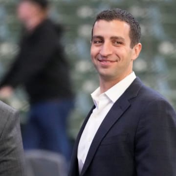 David Stearns on the field in Milwaukee before a game in 2022.