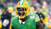 Jan 1, 2024; Glendale, AZ, USA; Oregon Ducks linebacker Jeffrey Bassa (2) against the Liberty Flames during the 2024 Fiesta Bowl at State Farm Stadium. Mandatory Credit: Mark J. Rebilas-Imagn Images