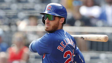 Aug 28, 2024; Pittsburgh, Pennsylvania, USA;  Chicago Cubs right fielder Cody Bellinger (24) hits into a fielders choice against the Pittsburgh Pirates during the seventh inning at PNC Park.