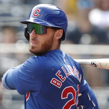 Aug 28, 2024; Pittsburgh, Pennsylvania, USA;  Chicago Cubs right fielder Cody Bellinger (24) hits into a fielders choice against the Pittsburgh Pirates during the seventh inning at PNC Park