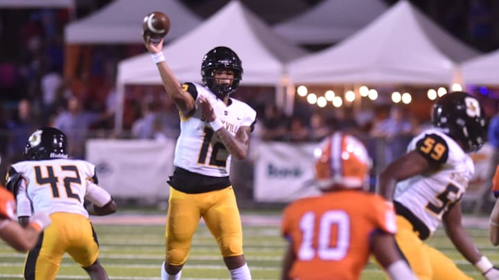 Starkville QB Trey Petty (12) looks for his man during his team   s Friday night football game against Madison Central High School. Madison Central defeated visitors Starkville High School 41-21 at Jaguar Stadium in Madison, MS on Friday, September 23, 2022.