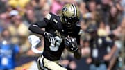 Purdue Boilermakers wide receiver Nitro Tuggle (0) evades a tackle