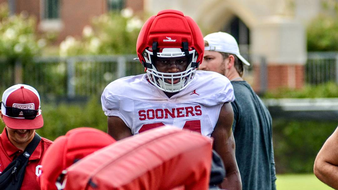 Oklahoma defensive end Adepoju Adebawore practices during fall camp. Oklahoma defensive end Adepoju Adebawore practices during fall camp.