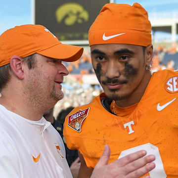 Tennessee head coach Josh Heupel turns to quarterback Nico Iamaleava (8) after their post game interview after winning the Citrus Bowl NCAA College football game on Monday, January 1, 2024 in Orlando, Fla. against Iowa.