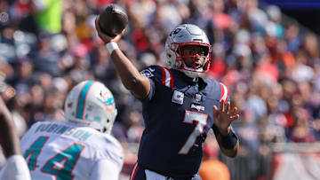 Oct 6, 2024; Foxborough, Massachusetts, USA; New England Patriots quarterback Jacoby Brissett (7) throws the ball during the first half against the Miami Dolphins at Gillette Stadium. Mandatory Credit: Paul Rutherford-Imagn Images