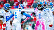Ole Miss Rebels defensive end Princewill Umanmielen (1) and linebacker Suntarine Perkins (4) provide a tremendous challenge for Florida.