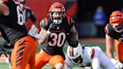 Dec 22, 2024; Cincinnati, Ohio, USA;  Cincinnati Bengals running back Chase Brown (30) runs during the first quarter against the Cleveland Browns at Paycor Stadium. Mandatory Credit: Joseph Maiorana-Imagn Images