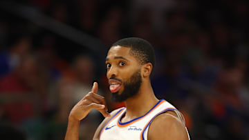 Nov 20, 2024; Phoenix, Arizona, USA; New York Knicks forward Mikal Bridges (25) celebrates a shot against the Phoenix Suns at Footprint Center. Mandatory Credit: Mark J. Rebilas-Imagn Images