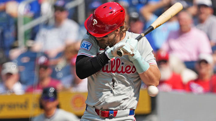 Sep 4, 2024; Toronto, Ontario, CAN; Philadelphia Phillies first baseman Bryce Harper (3) gets hit with a pitch against the Toronto Blue Jays during the first inning at Rogers Centre