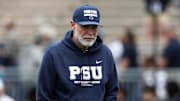 Penn State Nittany Lions defensive coordinator Jim Knowles walks on the field prior to the Blue-White Game at Beaver Stadium.