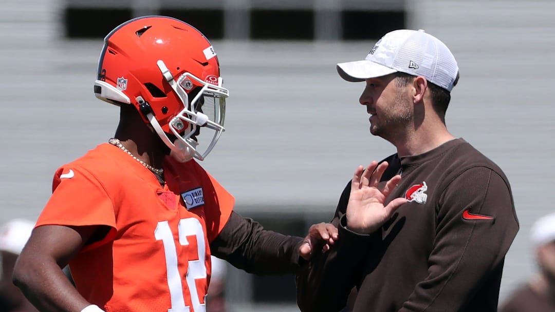 Browns quarterback Shedeur Sanders works with offensive coordinator Tommy Rees during rookie minicamp May 9, 2025, in Berea. Browns quarterback Shedeur Sanders works with offensive coordinator Tommy Rees during rookie minicamp May 9, 2025, in Berea.