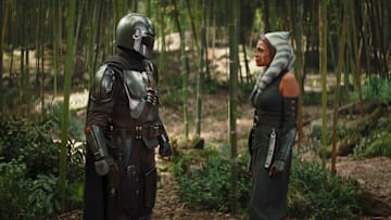 (L-R): The Mandalorian (Pedro Pascal) and Ahsoka Tano (Rosario Dawson) in Lucasfilm's THE BOOK OF BOBA FETT, exclusively on Disney+. © 2022 Lucasfilm Ltd. & ™. All Rights Reserved.