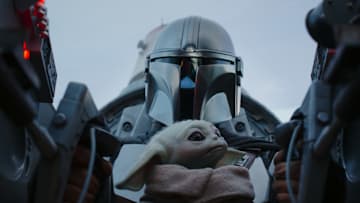 Din Djarin and Grogu in Lucasfilm's THE MANDALORIAN season 3, exclusively on Disney+. 
