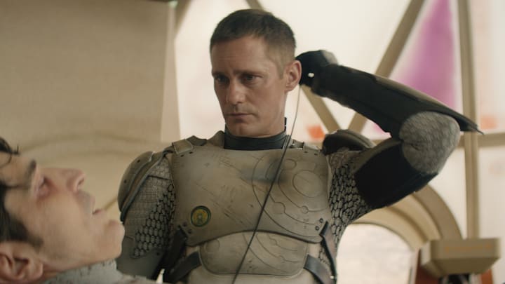David Dastmalchian and Alexander Skarsgård in "Murderbot," now streaming on Apple TV+.