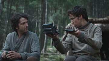 (L-R): Cassian Andor (Diego Luna) and Karis Nemik (Alex Lawther) in Lucasfilm's ANDOR, exclusively on Disney+. ©2022 Lucasfilm Ltd. & TM. All Rights Reserved.