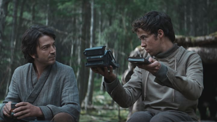(L-R): Cassian Andor (Diego Luna) and Karis Nemik (Alex Lawther) in Lucasfilm's ANDOR, exclusively on Disney+. ©2022 Lucasfilm Ltd. & TM. All Rights Reserved.