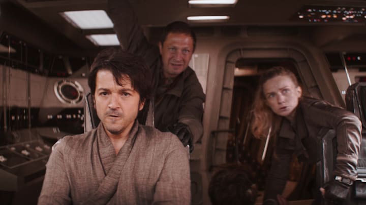 (L-R): Cassian Andor (Diego Luna), Arvel Skeen (Ebon Moss-Bachrach), Karis Nemik (Alex Lawther, seated) and Vel Sartha (Faye Marsay) in Lucasfilm's ANDOR, exclusively on Disney+. ©2022 Lucasfilm Ltd. & TM. All Rights Reserved.
