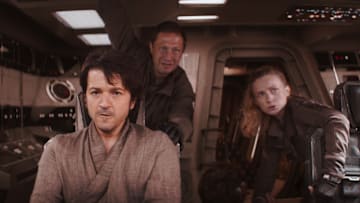 (L-R): Cassian Andor (Diego Luna), Arvel Skeen (Ebon Moss-Bachrach), Karis Nemik (Alex Lawther, seated) and Vel Sartha (Faye Marsay) in Lucasfilm's ANDOR, exclusively on Disney+. ©2022 Lucasfilm Ltd. & TM. All Rights Reserved.