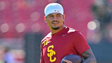Oct 11, 2025; Los Angeles, California, USA;  USC Trojans quarterback Jayden Maiava (14) warms up prior to the game against the Michigan Wolverines at United Airlines Field at the Los Angeles Memorial Coliseum. Mandatory Credit: Jayne Kamin-Oncea-Imagn Images