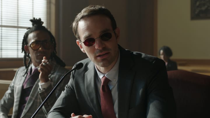 (L-R): Griffin Matthews as Luke Jacobson and Charlie Cox as Daredevil/Matt Murdock in Marvel Studios' She-Hulk: Attorney at Law, exclusively on Disney+. Photo courtesy of Marvel Studios. © 2022 MARVEL.