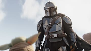 (L-R): Grogu and Din Djarin (Pedro Pascal) in Lucasfilm's THE MANDALORIAN, season three, exclusively on Disney+. ©2023 Lucasfilm Ltd. & TM. All Rights Reserved.