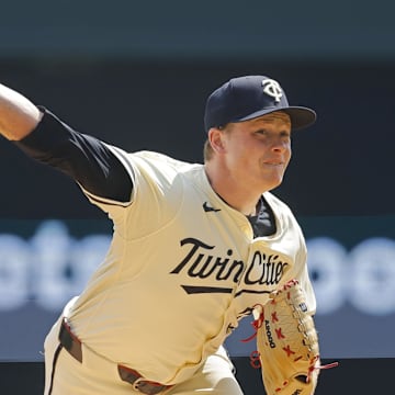 Minnesota Twins starting pitcher Louie Varland (37) throws against the Kansas City Royals in the first inning at Target Field in Minneapolis on Aug. 14, 2024.