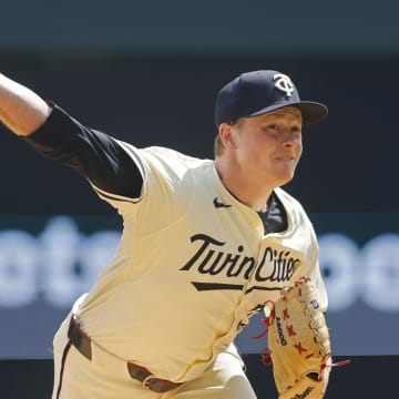 Minnesota Twins starting pitcher Louie Varland (37) throws against the Kansas City Royals in the first inning at Target Field in Minneapolis on Aug. 14, 2024. 