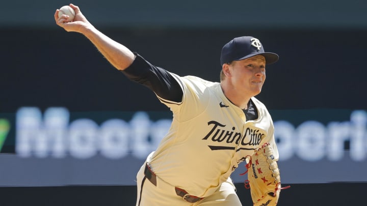 Minnesota Twins starting pitcher Louie Varland (37) throws against the Kansas City Royals in the first inning at Target Field in Minneapolis on Aug. 14, 2024. 