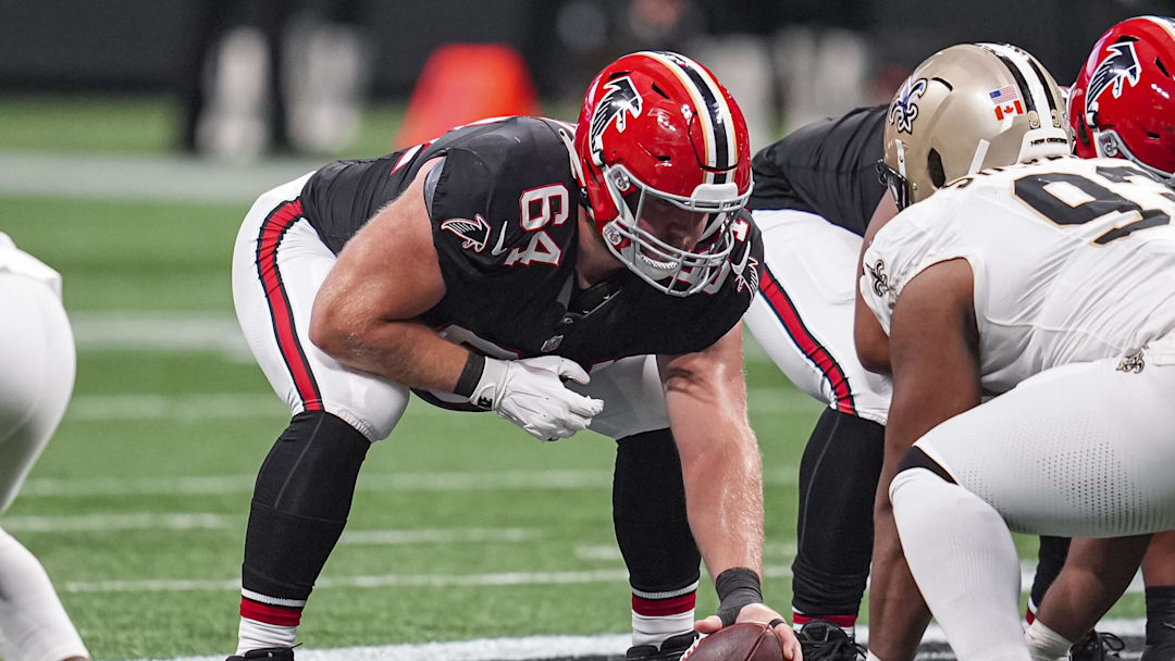 Sep 29, 2024; Atlanta, Georgia, USA; Atlanta Falcons guard Ryan Neuzil (64) in action against the New Orleans Saints at Mercedes-Benz Stadium. Mandatory Credit: Dale Zanine-Imagn Images