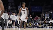 Mar 11, 2025; Charlotte, NC, USA; Virginia Tech Hokies guard Jaydon Young (3) reacts to a play against the California Golden Bears during the second half at Spectrum Center. Mandatory Credit: Jim Dedmon-Imagn Images