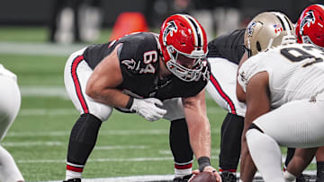 Sep 29, 2024; Atlanta, Georgia, USA; Atlanta Falcons guard Ryan Neuzil (64) in action against the New Orleans Saints at Mercedes-Benz Stadium. Mandatory Credit: Dale Zanine-Imagn Images