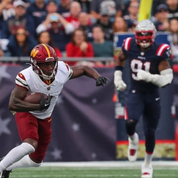 Nov 5, 2023; Foxborough, Massachusetts, USA; Washington Commanders receiver Byron Pringle (3) runs after a catch during the first half against the New England Patriots at Gillette Stadium. Mandatory Credit: Paul Rutherford-USA TODAY Sports