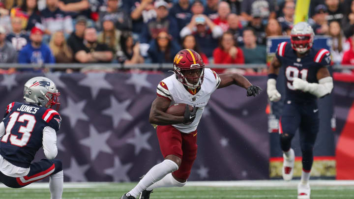 Nov 5, 2023; Foxborough, Massachusetts, USA; Washington Commanders receiver Byron Pringle (3) runs after a catch during the first half against the New England Patriots at Gillette Stadium. Mandatory Credit: Paul Rutherford-USA TODAY Sports