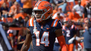 Sep 14, 2024; Champaign, Illinois, USA;  Illinois Fighting Illini defensive back Xavier Scott (14) during the second half at Memorial Stadium. Mandatory Credit: Ron Johnson-Imagn Images