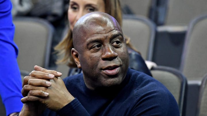 Mar 23, 2018; Omaha, NE, USA; NBA former player Magic Johnson watches during the first half between the Clemson Tigers and the Kansas Jayhawks in the semifinals of the Midwest regional of the 2018 NCAA Tournament at CenturyLink Center. Mandatory Credit: Kyle Terada-USA TODAY Sports