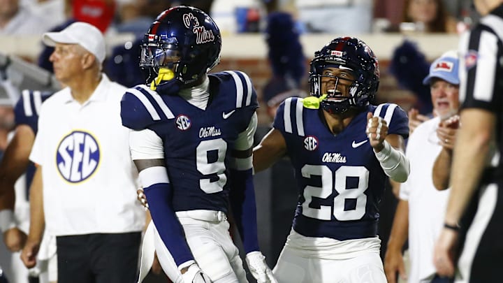 Aug 31, 2024; Oxford, Mississippi, USA; Mississippi Rebels defensive back Trey Amos (9) and defensive back Jadon Canady (28) react after a pass break up during the first half against the Furman Paladins at Vaught-Hemingway Stadium. Mandatory Credit: Petre Thomas-Imagn Images