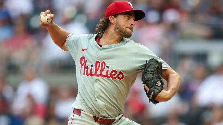 Jul 5, 2024; Atlanta, Georgia, USA; Philadelphia Phillies starting pitcher Aaron Nola (27) throws against the Atlanta Braves in the second inning at Truist Park. Mandatory Credit: Brett Davis-USA TODAY Sports