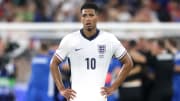 England advance as winners of Group C