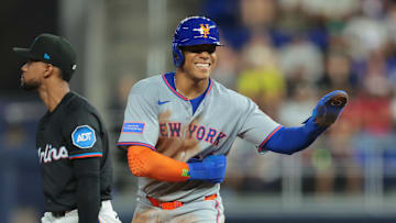 Sep 26, 2025; Miami, Florida, USA; New York Mets right fielder Juan Soto (22) reacts after stealing second base against the Miami Marlins during the third inning at loanDepot Park. Mandatory Credit: Sam Navarro-Imagn Images