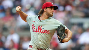 Jul 5, 2024; Atlanta, Georgia, USA; Philadelphia Phillies starting pitcher Aaron Nola (27) throws against the Atlanta Braves in the second inning at Truist Park. Mandatory Credit: Brett Davis-USA TODAY Sports