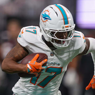 Oct 26, 2025; Atlanta, Georgia, USA; Miami Dolphins wide receiver Jaylen Waddle (17) scores a touchdown against the Atlanta Falcons in the third quarter at Mercedes-Benz Stadium. Mandatory Credit: Brett Davis-Imagn Images